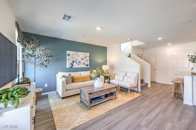 4948 Fern Mesa Ave Lot 130, Las Vegas, NV 89139 - living room featuring stairway, light wood-style flooring, and recessed lighting