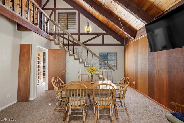 2169 Via Spes Nostra St, Mount Charleston, NV 89124 - dining area featuring a wood ceiling with exposed beams, carpet, stairway, and high vaulted ceiling