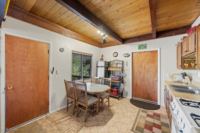 2169 Via Spes Nostra St, Mount Charleston, NV 89124 - dining space featuring a wood ceiling with exposed beams and baseboards