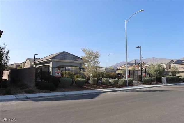 7022 Judith River St, North Las Vegas, NV 89084 - view of front of property with a mountain view and a residential view