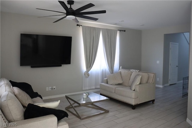 7022 Judith River St, North Las Vegas, NV 89084 - living room with a ceiling fan and light wood-style floors