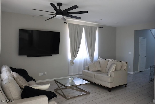 7022 Judith River St, North Las Vegas, NV 89084 - living area featuring ceiling fan and light wood-style flooring
