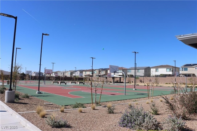 7022 Judith River St, North Las Vegas, NV 89084 - view of basketball court with community basketball court and a residential view