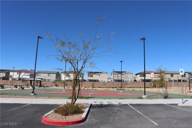 7022 Judith River St, North Las Vegas, NV 89084 - view of street with street lighting, a residential view, and curbs