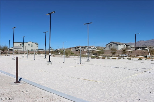 7022 Judith River St, North Las Vegas, NV 89084 - view of property's community with volleyball court and a residential view