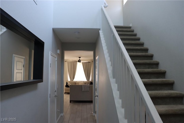 7022 Judith River St, North Las Vegas, NV 89084 - stairs featuring a ceiling fan and wood finished floors