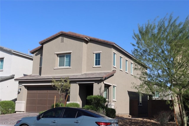 7022 Judith River St, North Las Vegas, NV 89084 - traditional home with a garage, stucco siding, and driveway