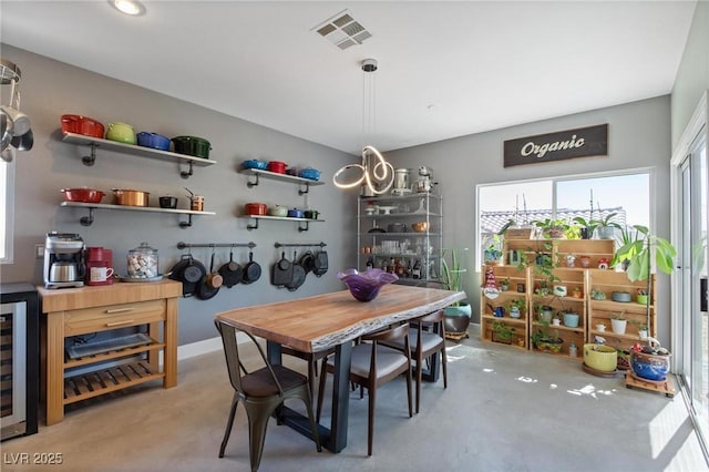 10596 Refugio St, Las Vegas, NV 89141 - dining room featuring wine cooler and baseboards