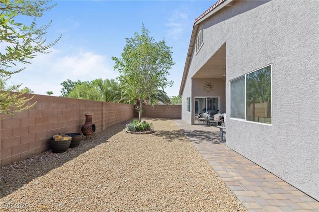 10596 Refugio St, Las Vegas, NV 89141 - fenced backyard featuring a patio