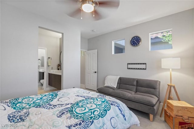 10596 Refugio St, Las Vegas, NV 89141 - bedroom with light colored carpet, ensuite bath, and ceiling fan