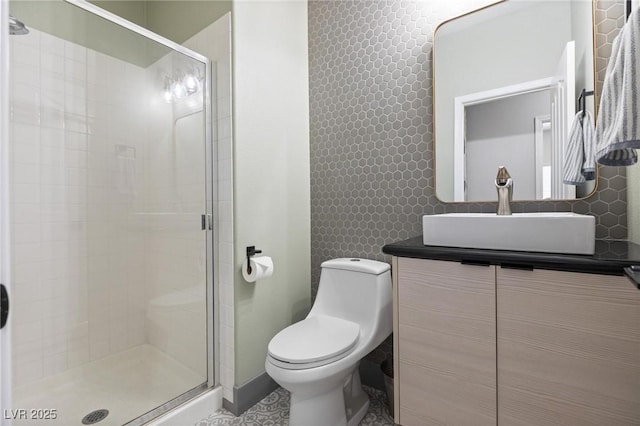 10596 Refugio St, Las Vegas, NV 89141 - bathroom featuring a shower stall, vanity, and tile walls