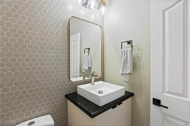 10596 Refugio St, Las Vegas, NV 89141 - bathroom featuring vanity and tile walls