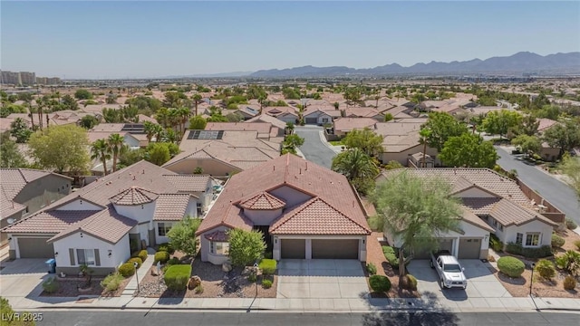 10596 Refugio St, Las Vegas, NV 89141 - aerial perspective of suburban area with a mountain backdrop
