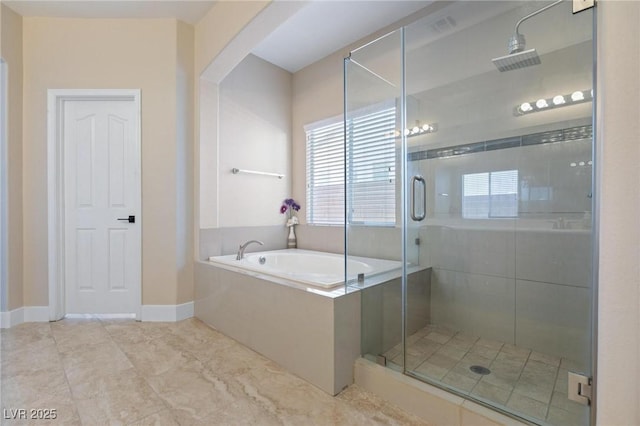 10596 Refugio St, Las Vegas, NV 89141 - bathroom with a garden tub, a stall shower, and tile patterned flooring