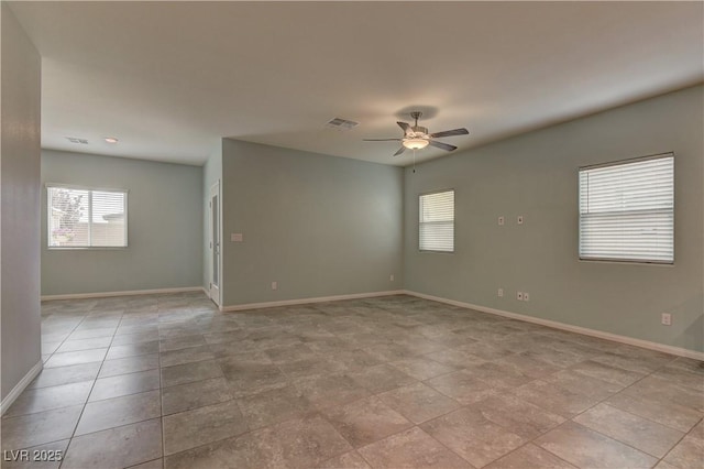 4441 Glossier Ave, North Las Vegas, NV 89084 - unfurnished room featuring a ceiling fan and baseboards