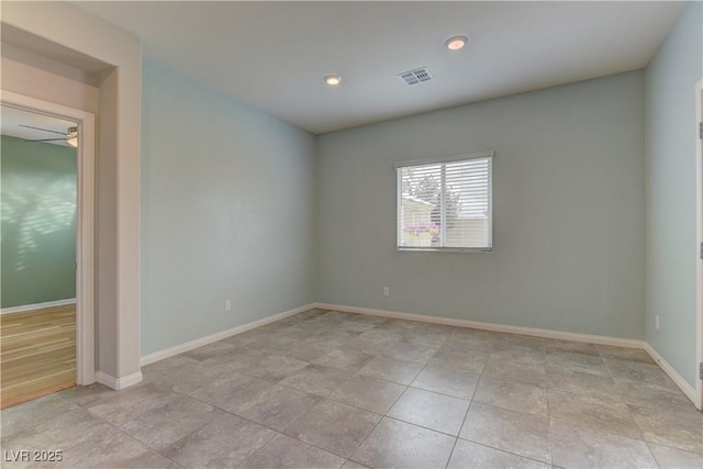 4441 Glossier Ave, North Las Vegas, NV 89084 - spare room featuring baseboards and recessed lighting
