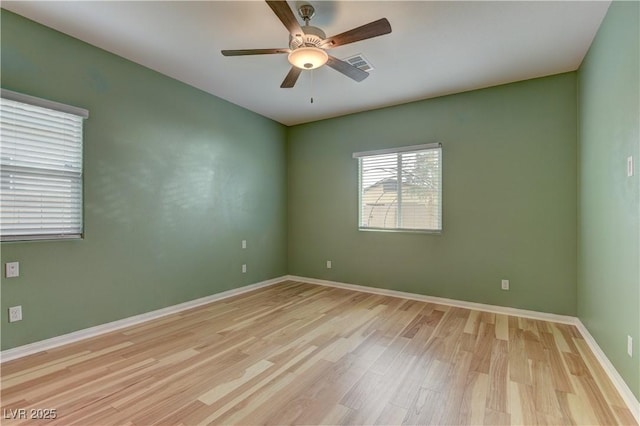 4441 Glossier Ave, North Las Vegas, NV 89084 - empty room with light wood finished floors and a ceiling fan