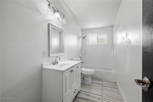 1915 Balboa Ave, Las Vegas, NV 89169 - full bath with vanity, shower / washtub combination, and a textured wall