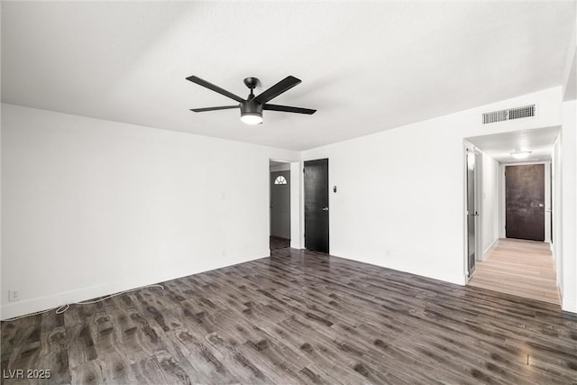 1915 Balboa Ave, Las Vegas, NV 89169 - empty room with ceiling fan and wood finished floors