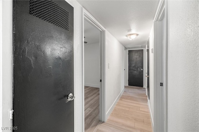 1915 Balboa Ave, Las Vegas, NV 89169 - hall featuring light wood finished floors and baseboards