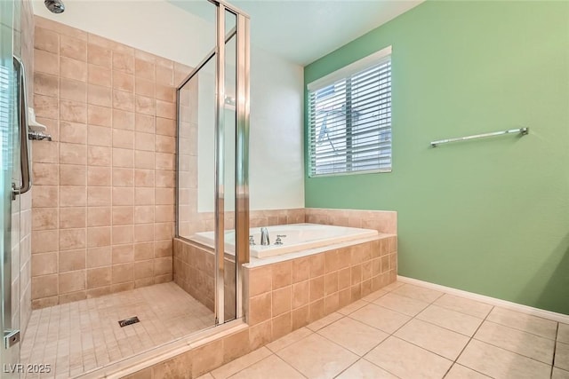 262 Pebble Canyon Dr, Las Vegas, NV 89123 - bathroom featuring tile patterned floors, a shower stall, and a bath