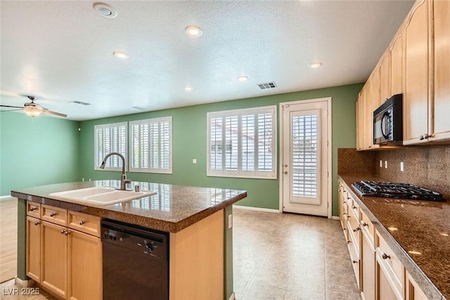 262 Pebble Canyon Dr, Las Vegas, NV 89123 - kitchen with black appliances, dark countertops, tasteful backsplash, a ceiling fan, and recessed lighting