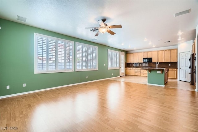 262 Pebble Canyon Dr, Las Vegas, NV 89123 - unfurnished living room featuring ceiling fan and light wood-style floors