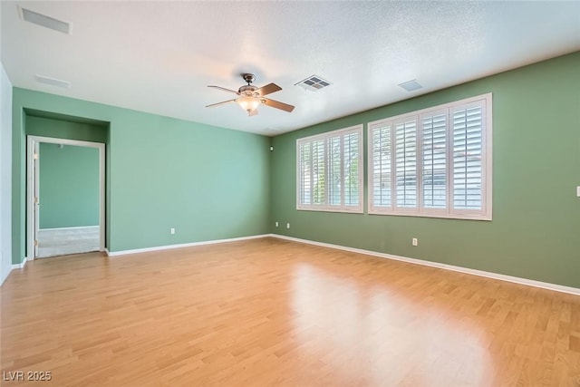 262 Pebble Canyon Dr, Las Vegas, NV 89123 - unfurnished room featuring light wood-style floors and a ceiling fan