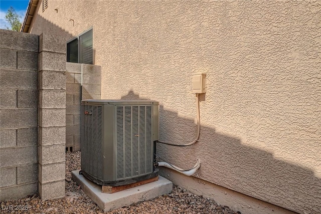 262 Pebble Canyon Dr, Las Vegas, NV 89123 - exterior view of a central AC unit and stucco siding