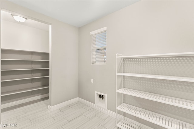 5676 Corona Vista St, Las Vegas, NV 89135 - washroom with hookup for an electric dryer and baseboards