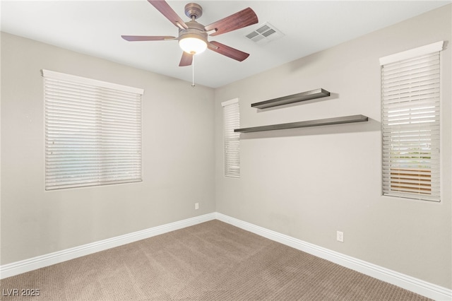 5676 Corona Vista St, Las Vegas, NV 89135 - carpeted spare room featuring a ceiling fan and baseboards