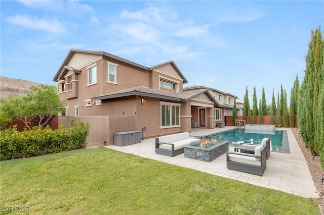 5676 Corona Vista St, Las Vegas, NV 89135 - back of house with stucco siding, a patio, a fenced backyard, an in-ground hot tub, and an outdoor living space with a fire pit