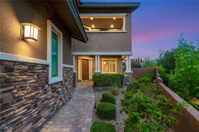 5676 Corona Vista St, Las Vegas, NV 89135 - view of exterior entry with stucco siding and stone siding