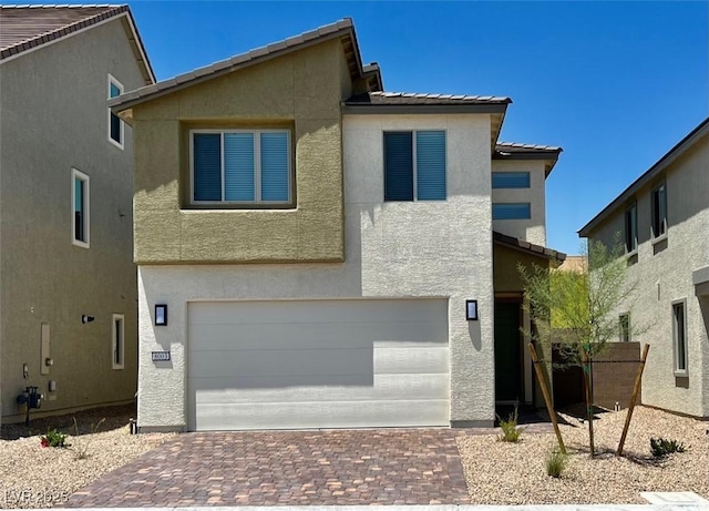 8003 Adelaide Hills St, Las Vegas, NV 89113 - view of front of property with stucco siding, a garage, decorative driveway, and a tiled roof