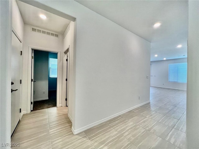 8003 Adelaide Hills St, Las Vegas, NV 89113 - hallway featuring light tile patterned flooring and recessed lighting