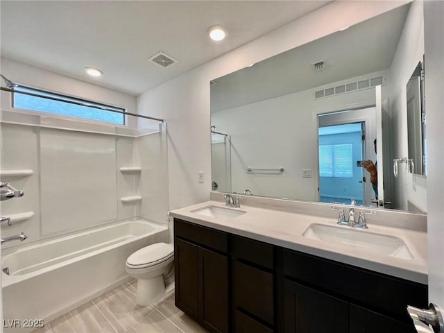 8003 Adelaide Hills St, Las Vegas, NV 89113 - full bathroom featuring tub / shower combination, double vanity, and healthy amount of natural light