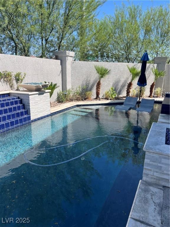 8094 Noble Ridge St, Las Vegas, NV 89139 - view of pool with a fenced backyard