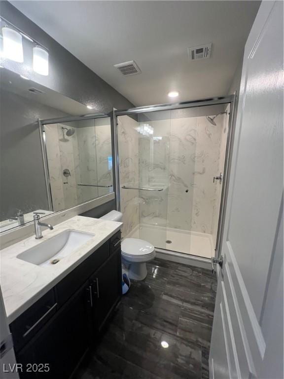 8094 Noble Ridge St, Las Vegas, NV 89139 - full bath with vanity, a shower stall, and wood finished floors