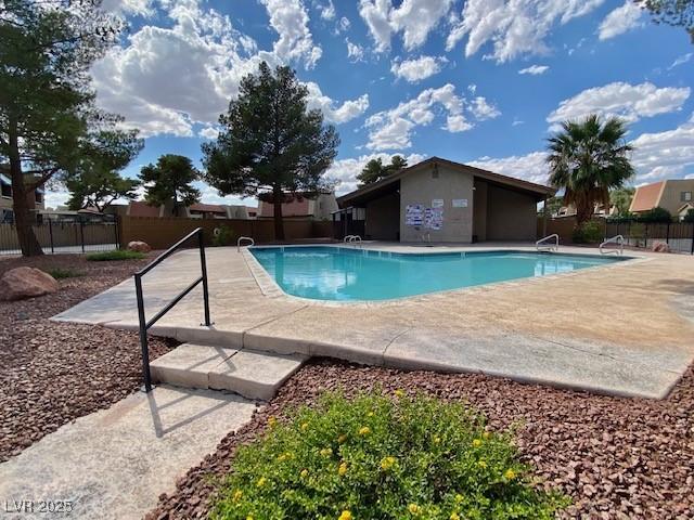 4242 Mississippi Ave, Las Vegas, NV 89103 - community pool with a patio area