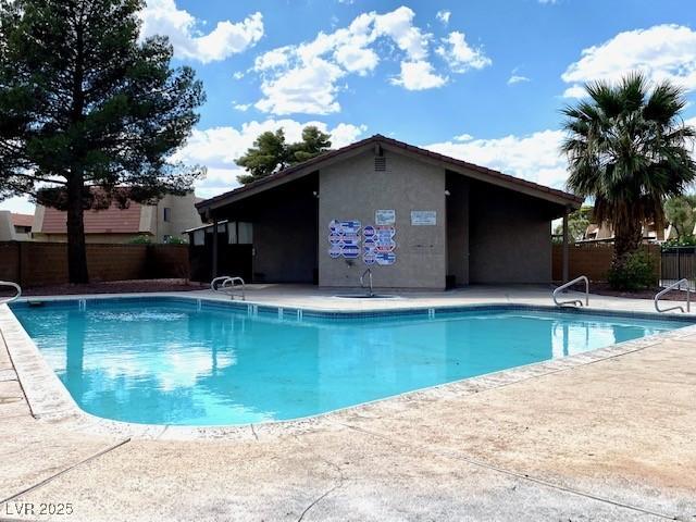 4242 Mississippi Ave, Las Vegas, NV 89103 - community pool featuring a patio