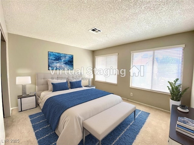 4242 Mississippi Ave, Las Vegas, NV 89103 - bedroom featuring light carpet and a textured ceiling