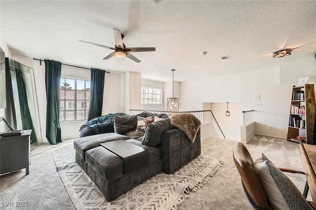 2133 Desert Pines St, Las Vegas, NV 89134 - carpeted living room featuring a ceiling fan and a textured ceiling