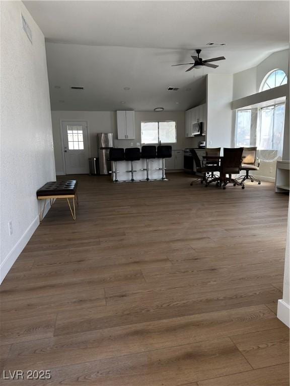 3160 James A Bilbray Pkwy, Laughlin, NV 89029 - living area with plenty of natural light, dark wood-type flooring, and ceiling fan