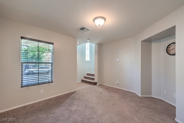 9065 Tantalizing Ave, Las Vegas, NV 89149 - carpeted spare room featuring stairs and baseboards