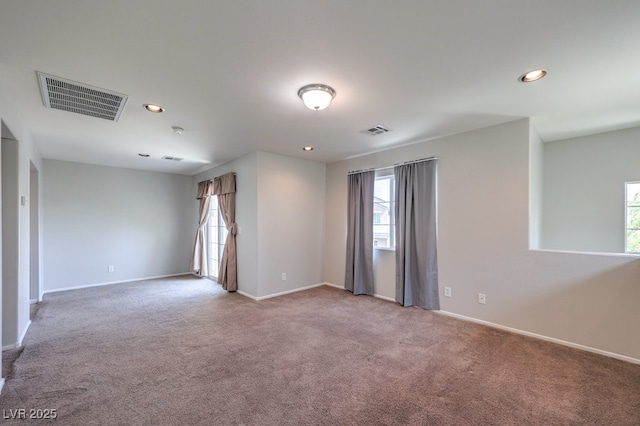 9065 Tantalizing Ave, Las Vegas, NV 89149 - carpeted empty room featuring healthy amount of natural light and recessed lighting
