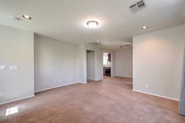 9065 Tantalizing Ave, Las Vegas, NV 89149 - carpeted spare room with recessed lighting and wine cooler