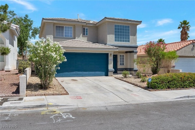 5204 Padua Way, Las Vegas, NV 89107 - traditional-style home with concrete driveway, a tiled roof, and stucco siding