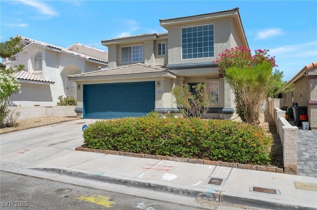 5204 Padua Way, Las Vegas, NV 89107 - traditional-style house featuring concrete driveway, stucco siding, and an attached garage