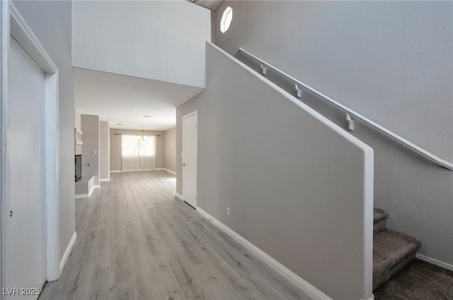 5204 Padua Way, Las Vegas, NV 89107 - stairway with wood finished floors and a chandelier