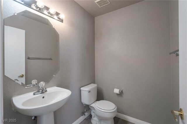 5204 Padua Way, Las Vegas, NV 89107 - half bath with a sink and toilet